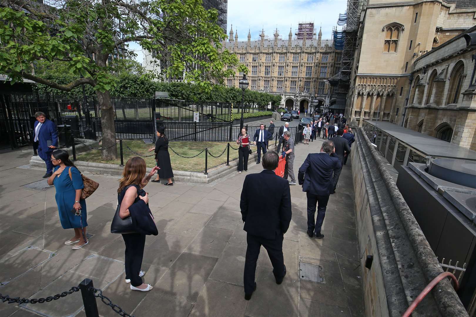 Members of Parliament queue outside the House of Commons (Jonathan Brady/PA)