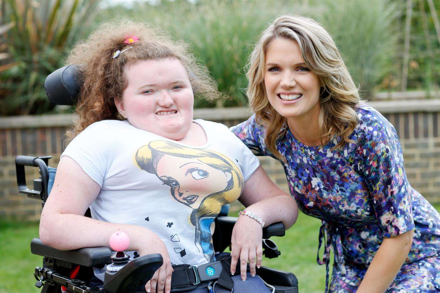Patron Charlotte Hawkins at the ellenor family fun day with Megan Payne, 15.