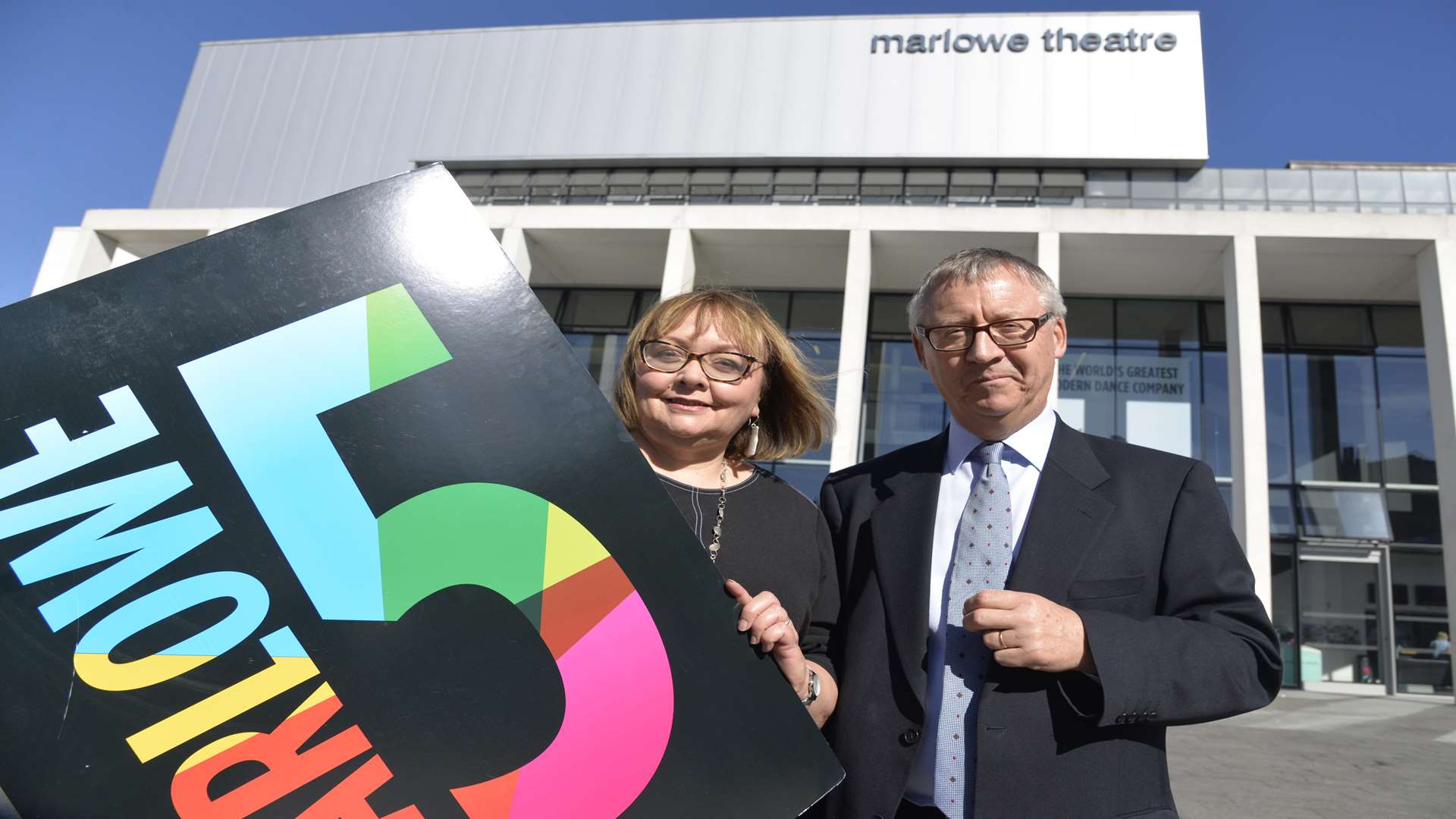Assistant director of commisioned services Janice McGuinness and theatre director Mark Everett outside the Marlowe Theatre as they celebrate five successful years