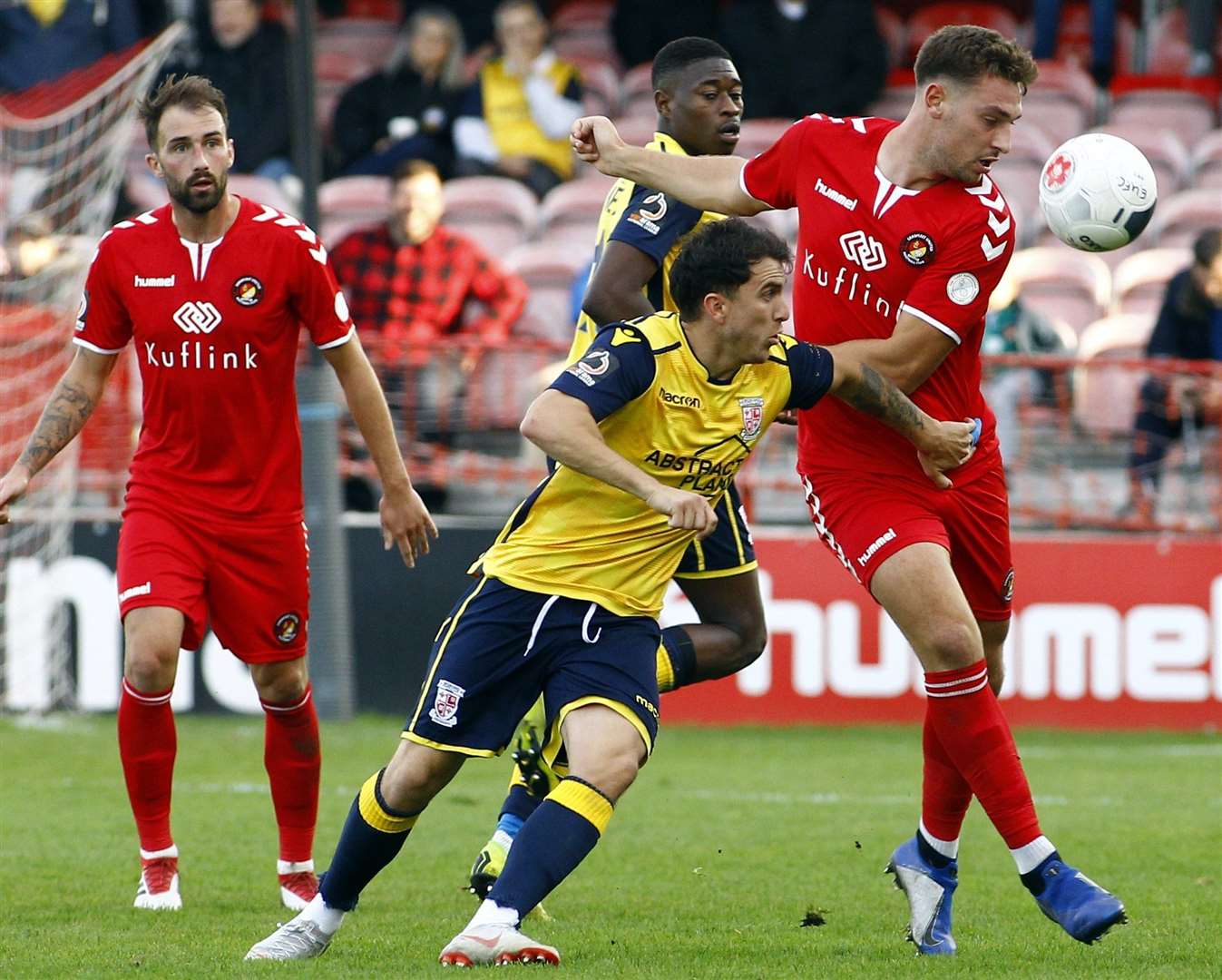 On-loan Ebbsfleet defender Tyler Cordner battles for possession earlier on this season against Woking Picture: Sean Aidan FM26230653