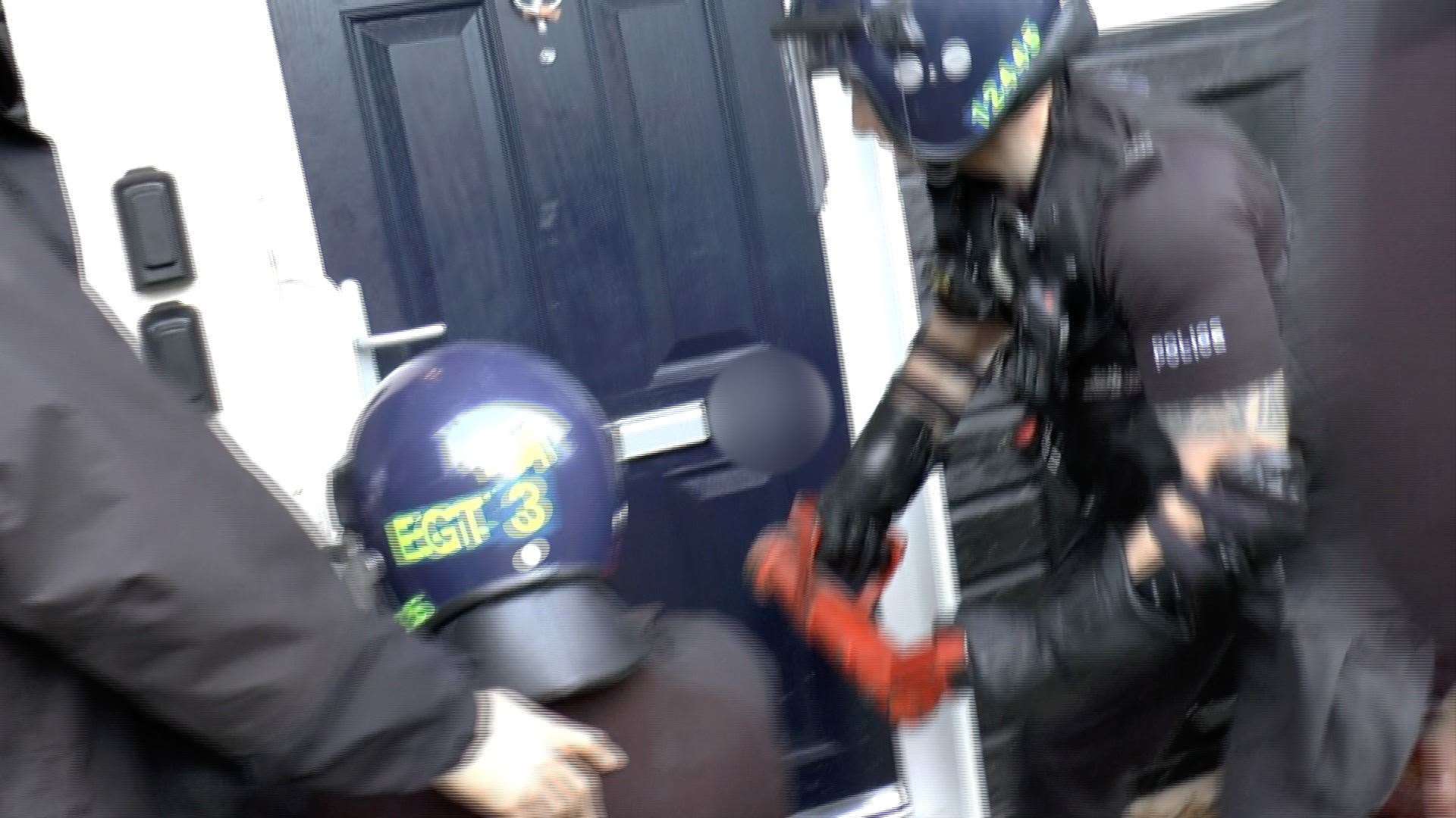 Police raid a house in Maidstone