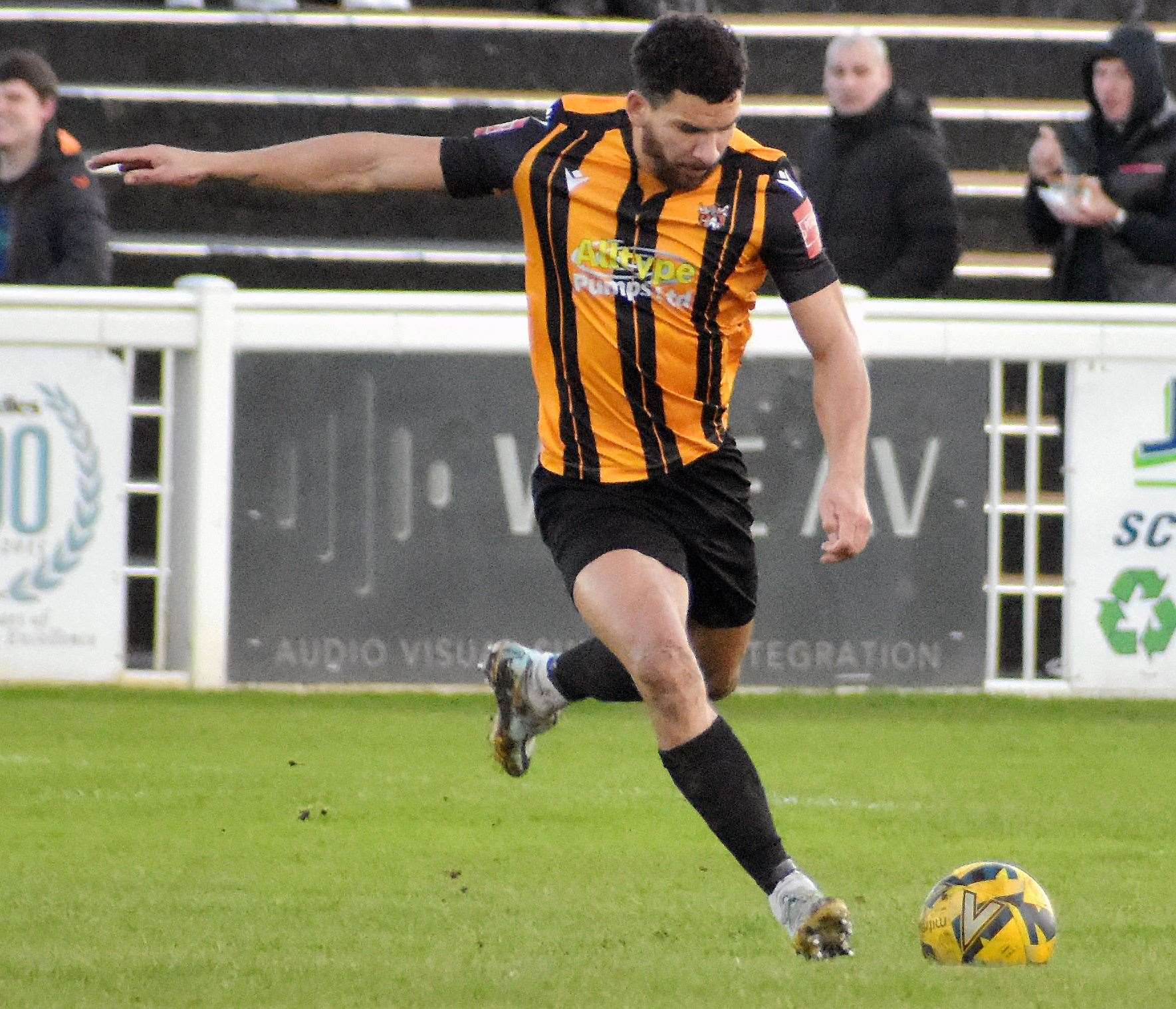 One of Folkestone's scorers, Nathan Green, sends the ball forward. Picture: Randolph File
