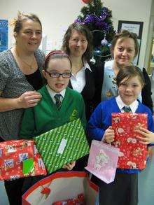 Children take presents to Medway Maritime Hospital