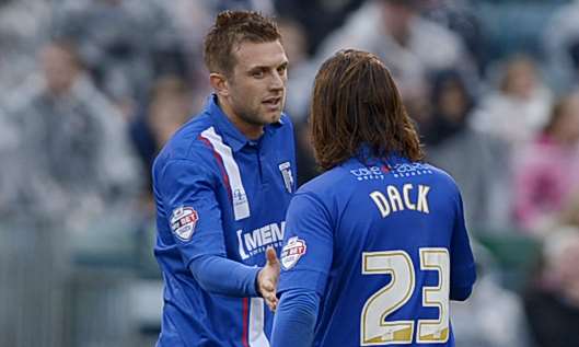 Captain Doug Loft is congratulated on his goal by Bradley Dack Picture: Barry Goodwin
