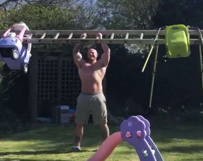 Callum's traded traditional weights for a ladder and his daughter's outdoor toys