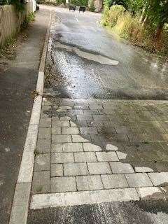 Robert reported the water 'pouring' down the road Picture: Robert Vallance