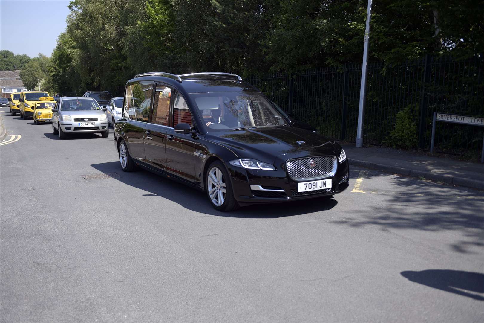 Several AA vans joined the funeral cortege as it left Mr Burridge's home in Rainham. Picture: Barry Goodwin