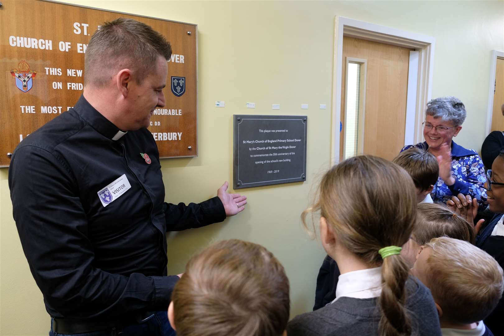 The unveiling of the anniversary plaque. The Rev Sean Sheffield with some of the children during the anniversary celebration. Picture: St Mary's C o fE Primary School, Dover