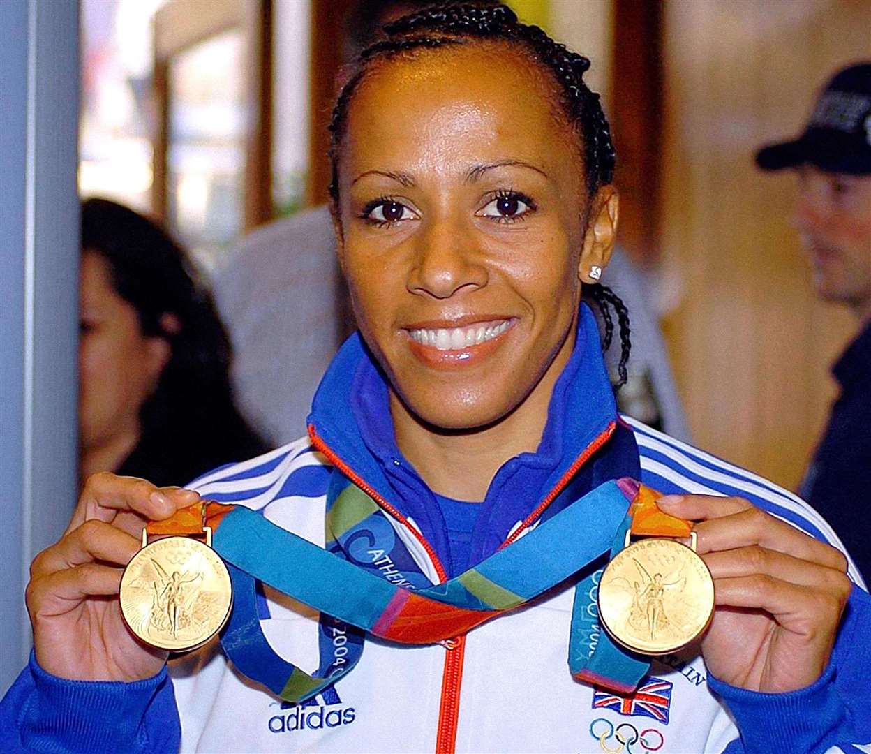 Dame Kelly with her two Olympic Gold Medals for 800m and 1500m events at the 2004 Olympics in Athens. Picture: Rebecca Naden/PA