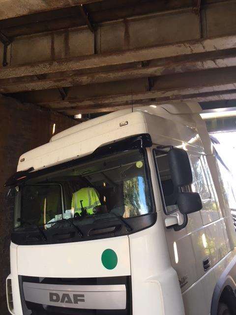 The lorry under the bridge. Picture courtesy of Network Rail