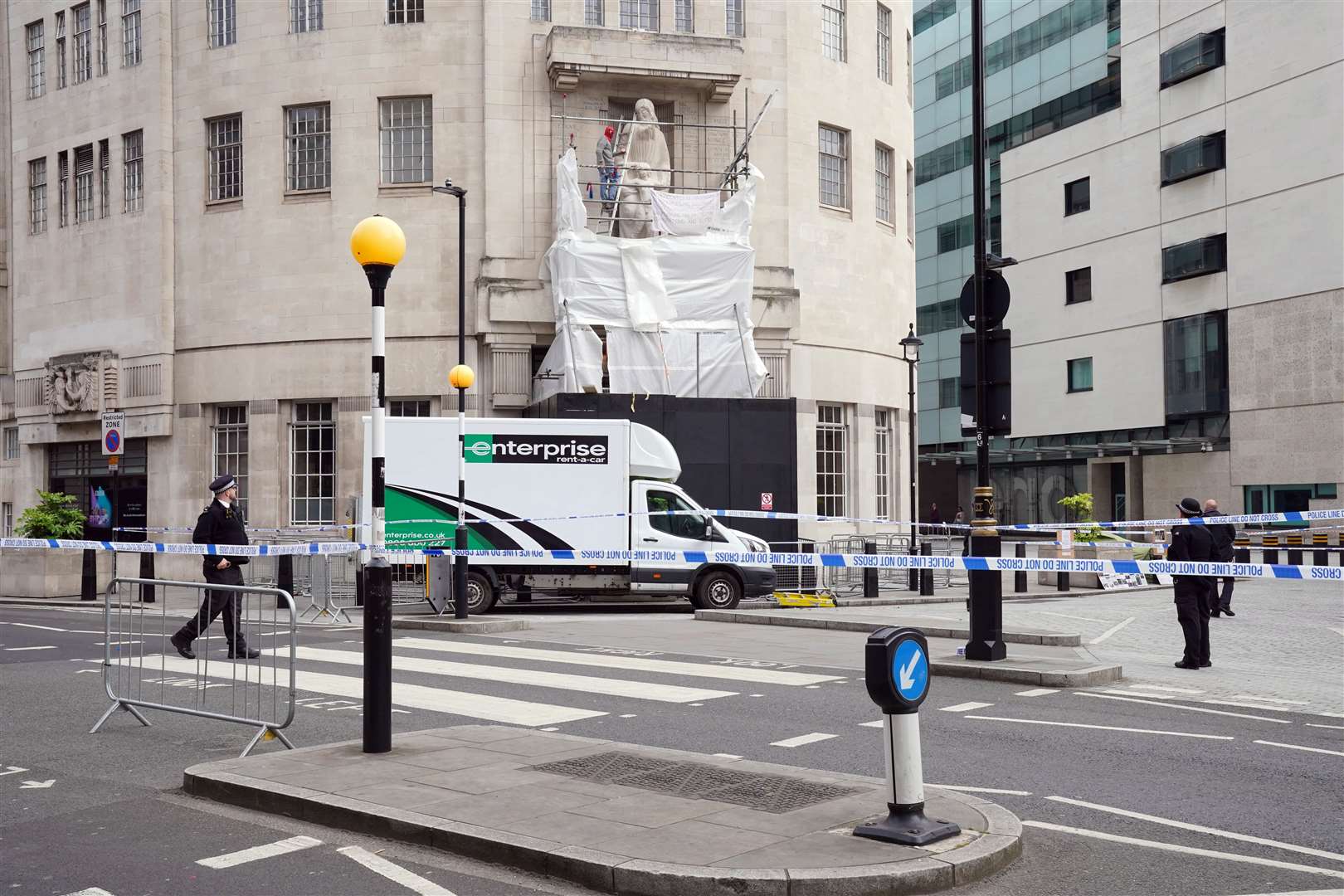 A police cordon outside BBC Broadcasting House in London (Jonathan Brady/PA)