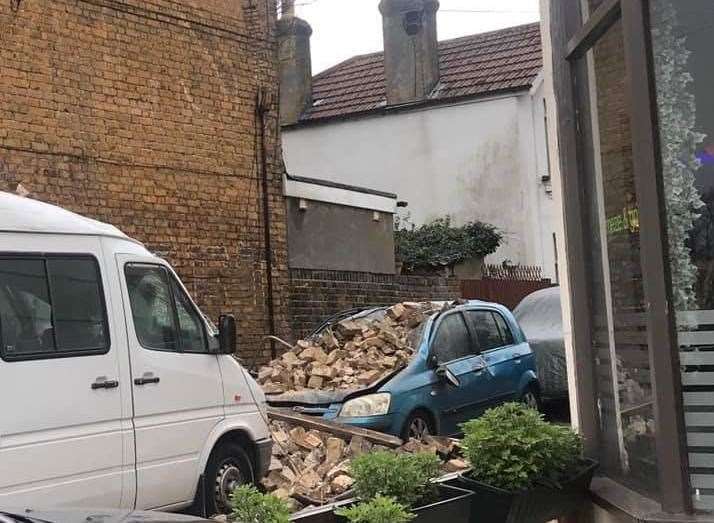 Rubble has fallen onto two cars in Broadstairs. Picture: Su Foster