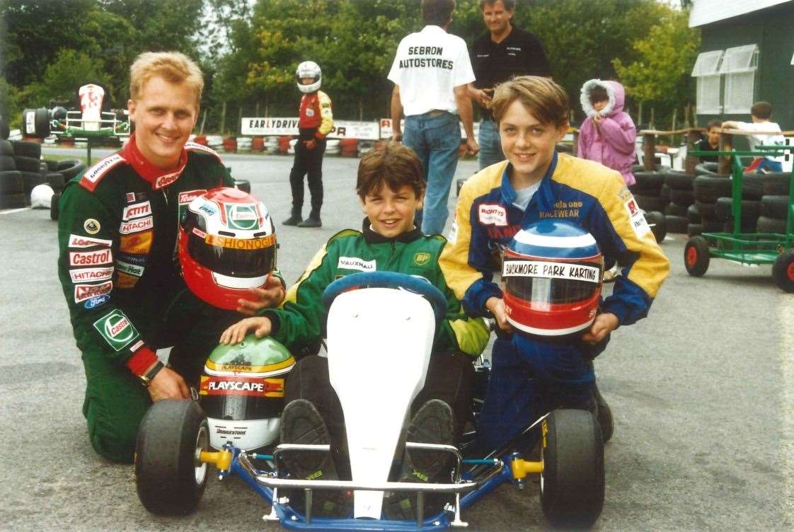 Herbert, in his Lotus F1 team overalls, with Gareth Howell and Tom Sisley, both aged 12. Howell's dad Martin created indoor karting with Bob Pope. In 2000, Gareth made his British Touring Car Championship debut and he scored three wins during his time in the series