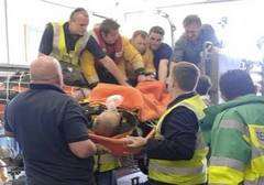 The rescued man is brought ashore at Whitstable Lifeboat station