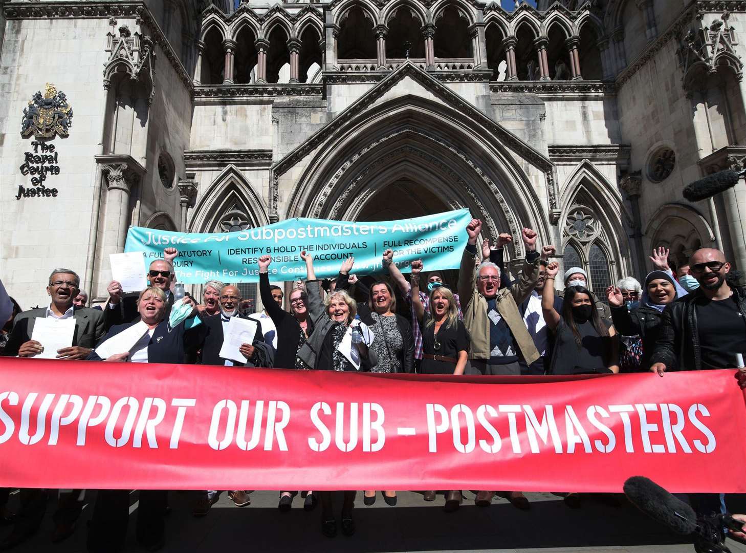 Former post office workers celebrating outside the Royal Courts of Justice after their convictions were overturned by the Court of Appeal in 2021. Photo: ITV