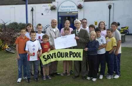 PROTEST: Campaigners outside the Sheerness swimming pool last year