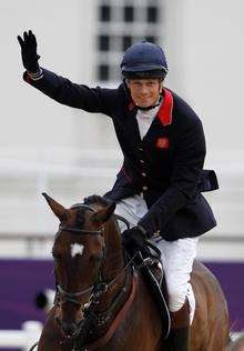William Fox-Pitt, from Canterbury, competes on Lionheart during the Team Eventing Jumping Final on day four of the London Olympic Games at Greenwich Park. Picture: Owen Humphreys/PA Wire