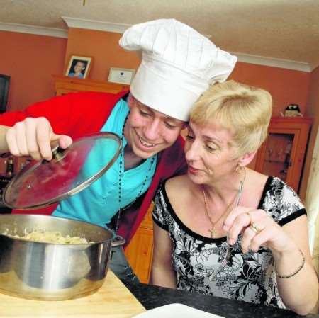 Daniel Read and his mum Denise having fun cooking