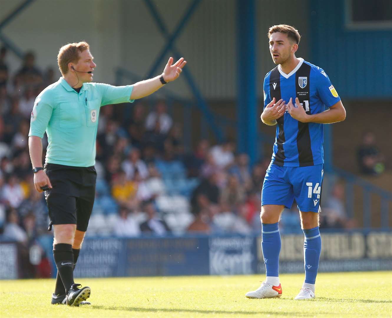 Gills defender Robbie McKenzie in conversation with referee John Busby. Picture: Andy Jones (51368843)