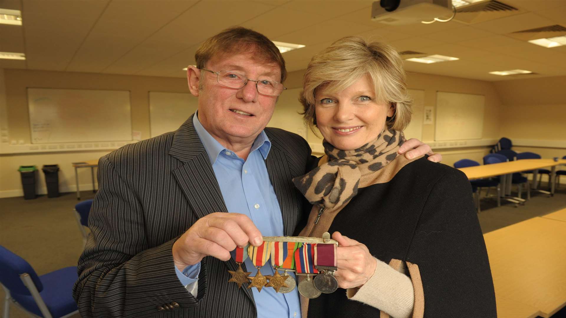 Leonard and Anne Hazeldine were reunited with the medals. Picture by Steve Crispe.