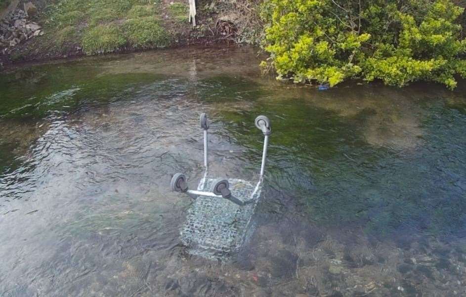 A shopping trolley dumped in the River Dour, Dover. Picture: Another fine mess in Dover cleaned up Facebook page