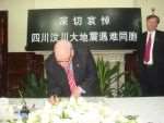 Sheppey MP Derek Wyatt signing a book of condolence in Shanghai