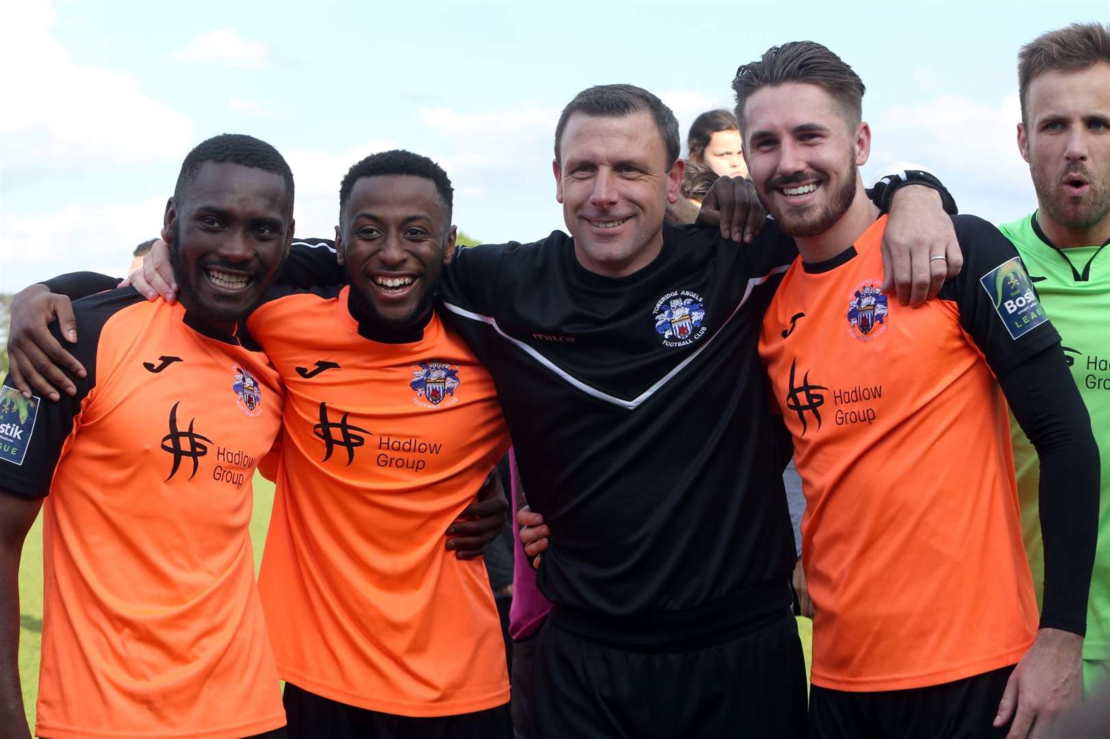 D'Sean Theobalds, second from left, celebrates Tonbridge's promotion with Chinedu McKenzie, Steve McKimm and Tom Derry Picture: David Couldridge