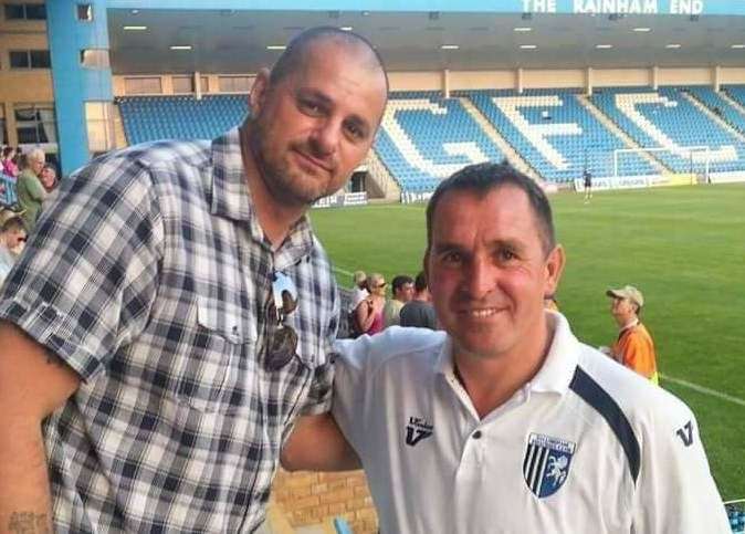 Gillingham supporter Graham Perry with title-winning boss Martin Allen