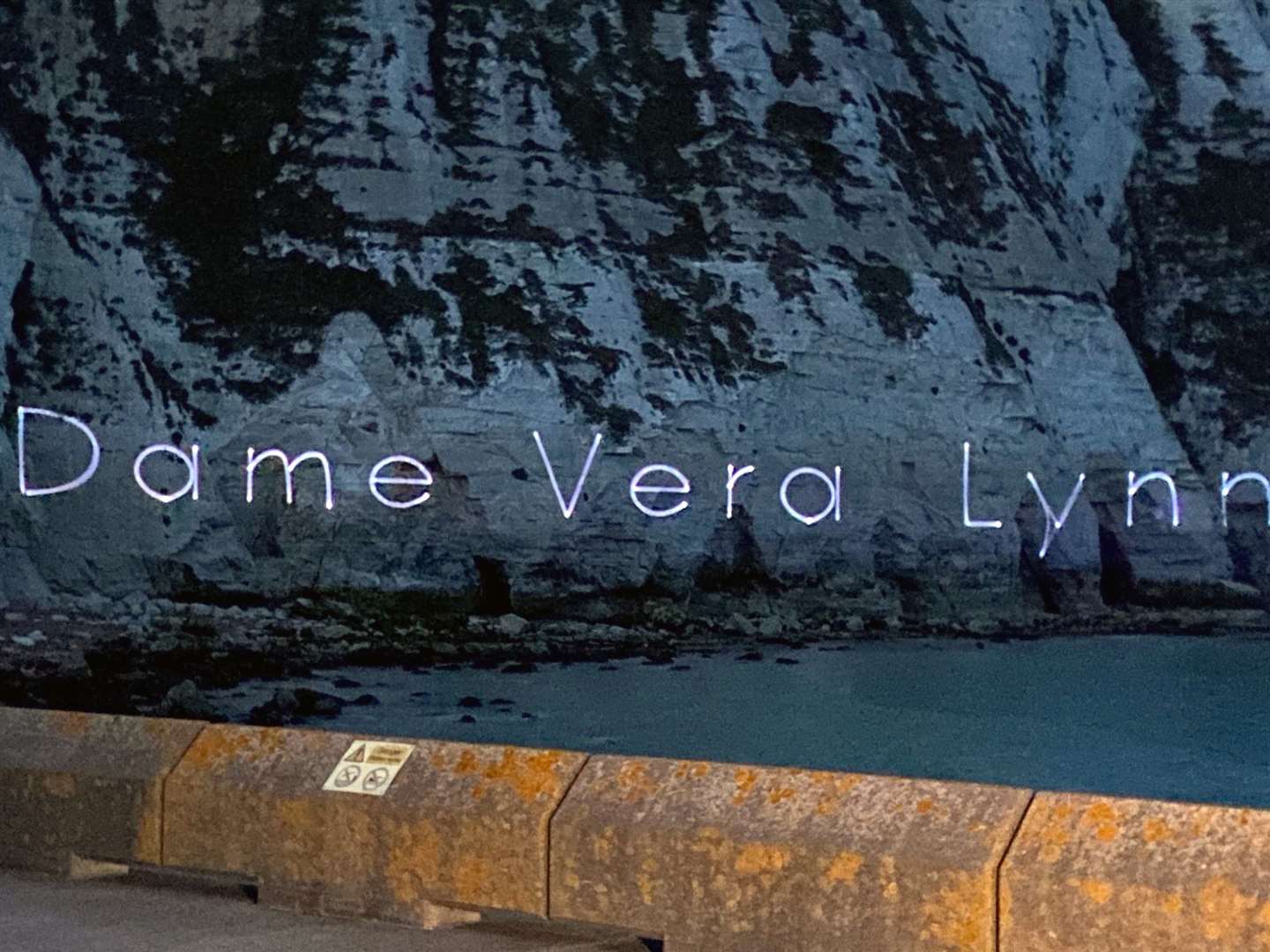 Beamed laser tribute to Dame Vera Lynn on the White Cliffs of Dover at Samphire Hoe Country Park, Dover..Picture: Barry Goodwin