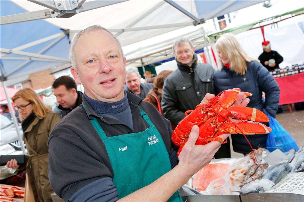 West Malling Farmers' Market. Paul Saxby of Arcade Fisheries with fresh lobster