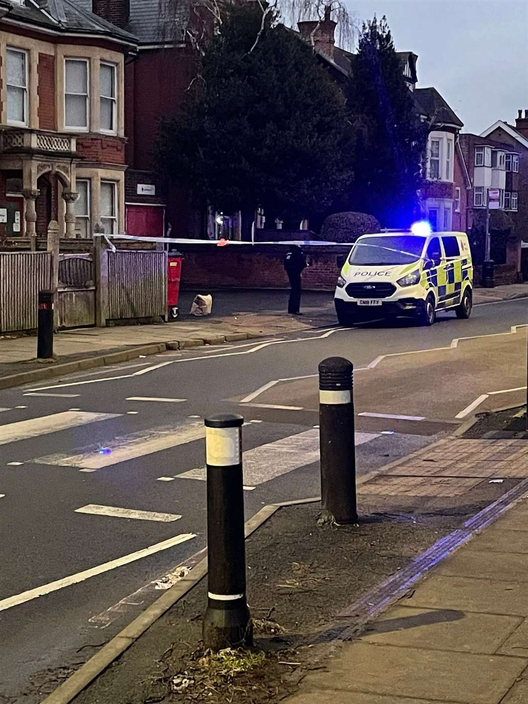 Police car outside a house near Grange Road, Gravesend