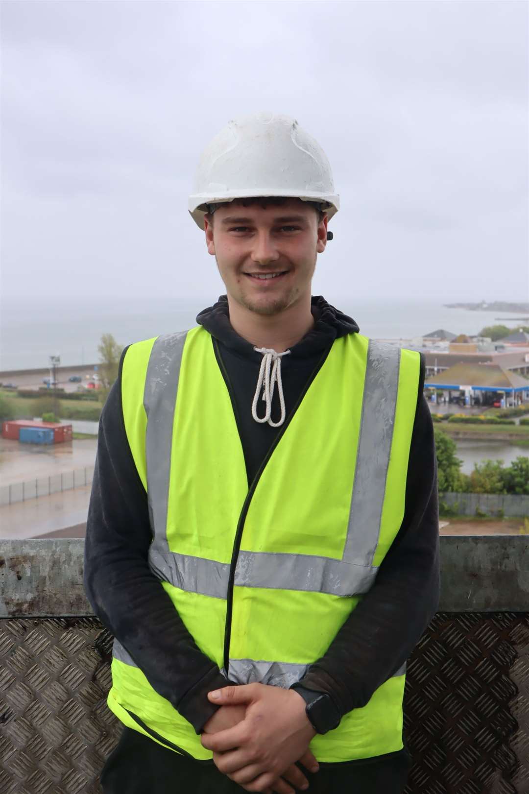 Apprentice Tommy Stower, 21, on top of the Sheerness Dockyard Church at Blue Town