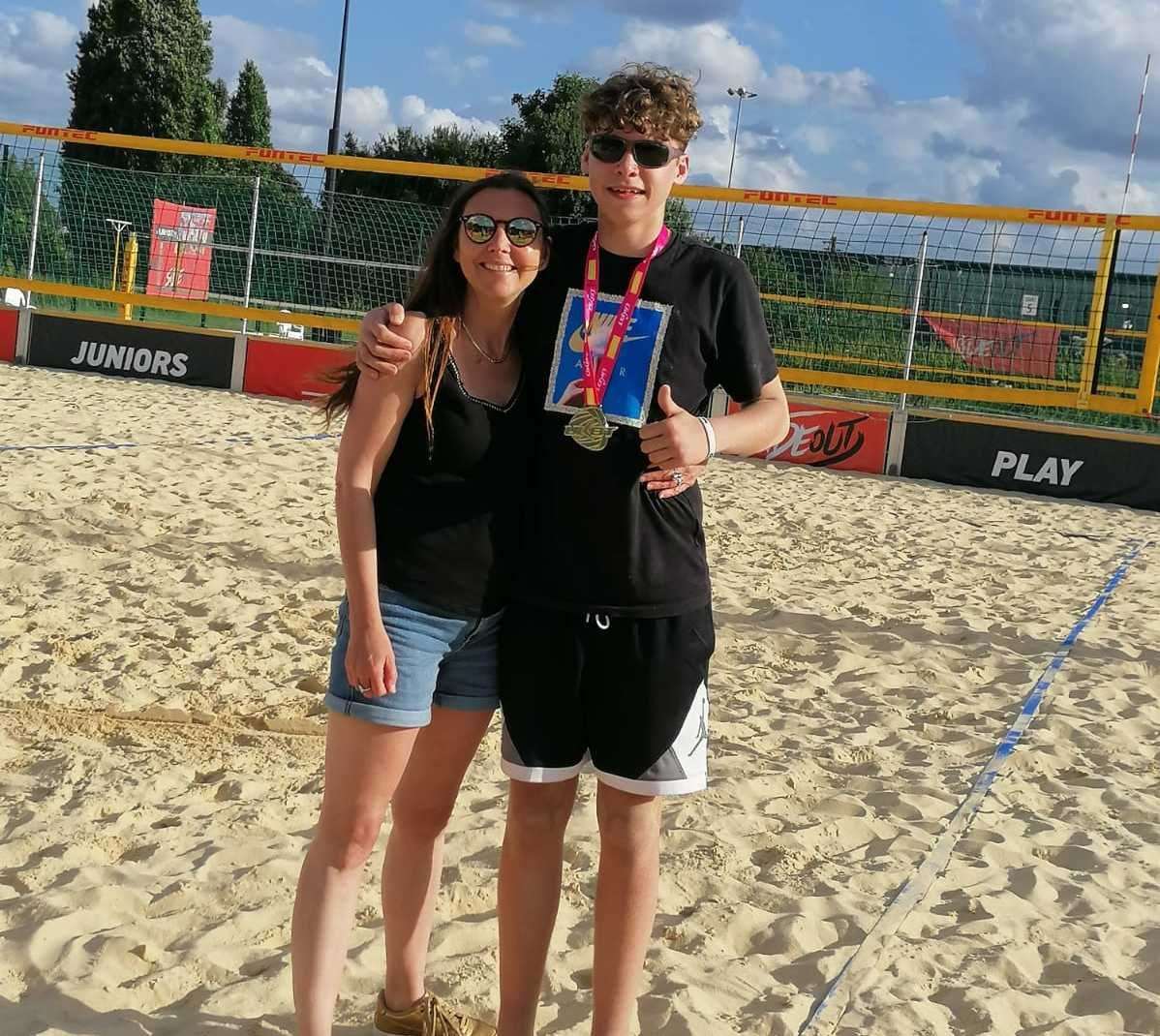 From left: Mum Sophie and Maxime at a beach volleyball tournament in Leyton. Picture: Sophie Henry