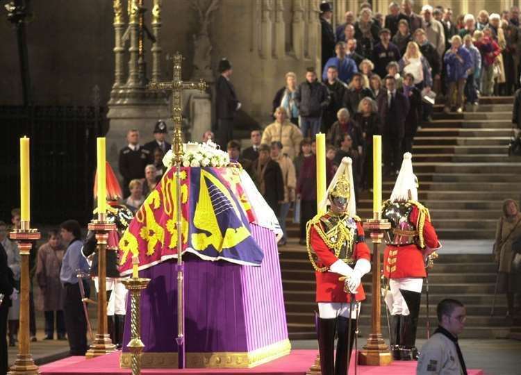People filing past the coffin of Queen Elizabeth The Queen Mother, in Westminster Hall in 2002. Picture: PA