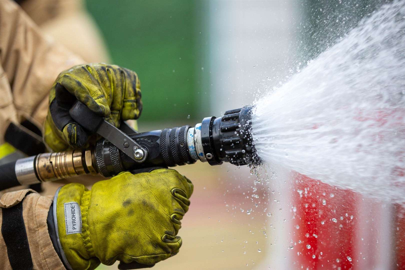 Firefighters used hose reel jets. Stock photo