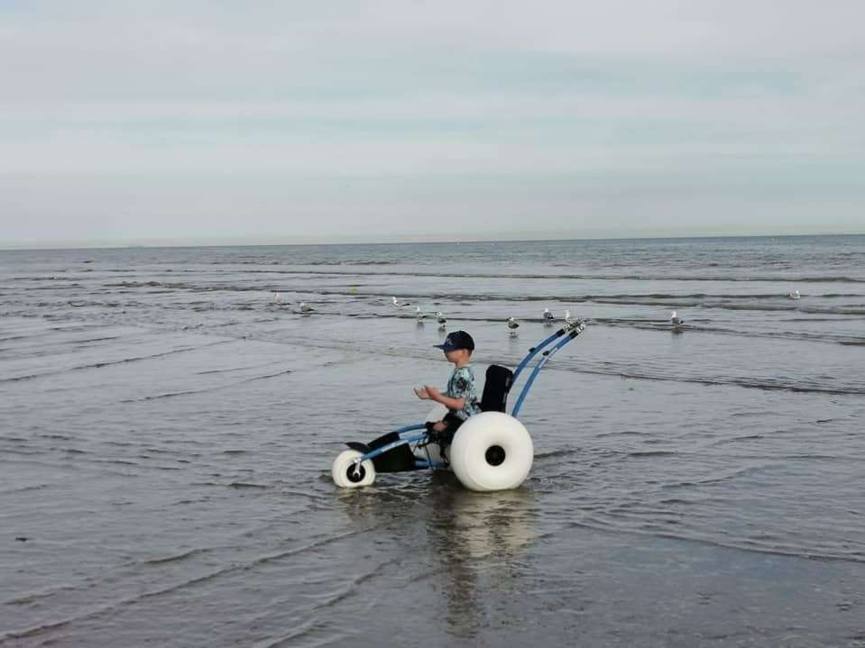 Tony Hudgell on his all-terrain wheelchair at Camber Sands (12339657)