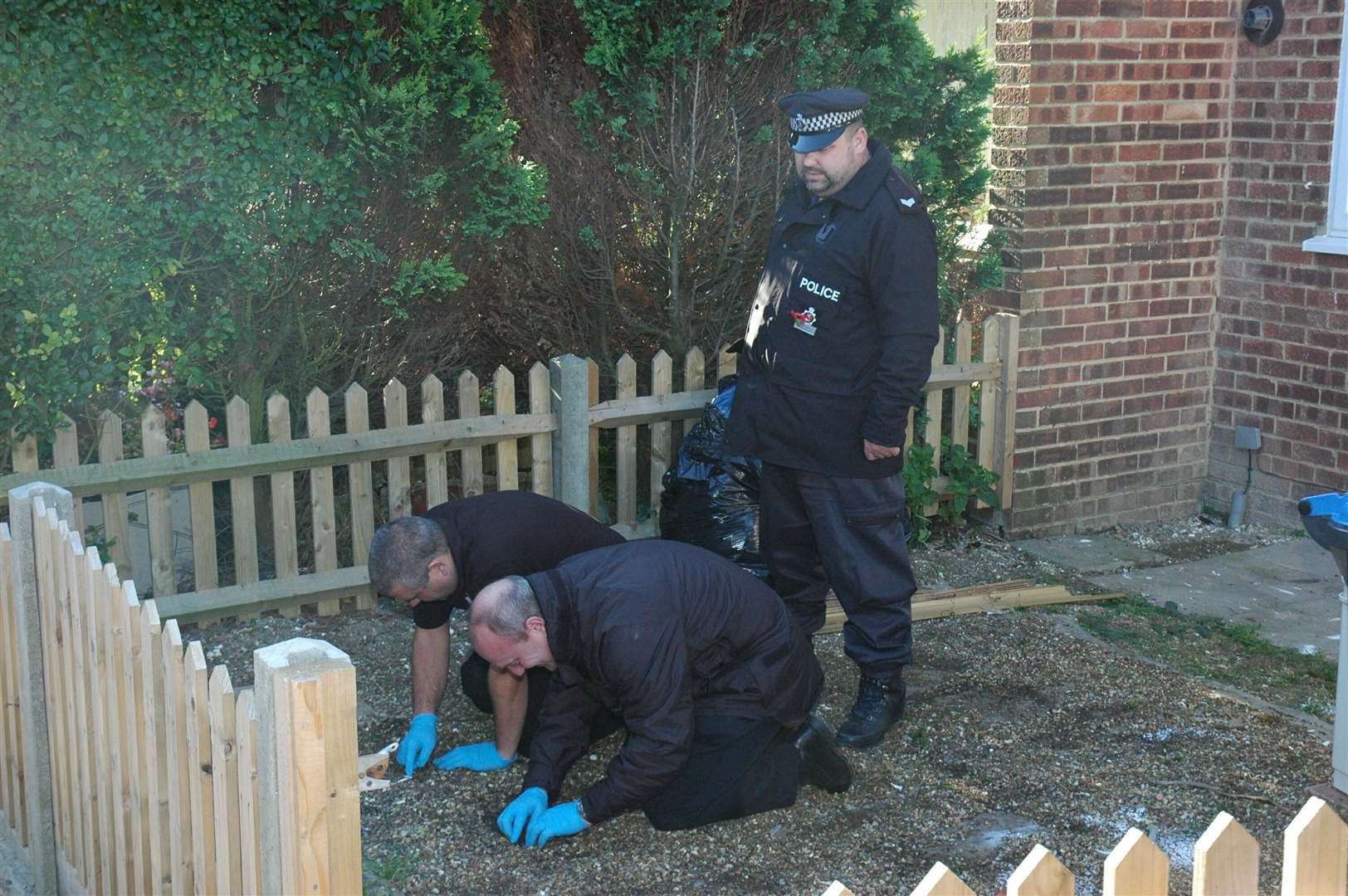 Police officers searching the garden of Peter Tobin's former home in Irvine Drive, Margate in the search for Dinah McNichol. Picture Nick Evans