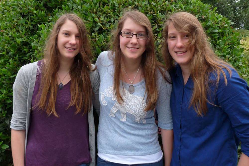 Triplets Emma, Lauren and Megan Carter, all pupils at Invicta Grammar School, achieved nine A* and three A grades between them