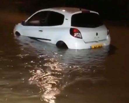 A car got stuck in the floods in Bearsted last night