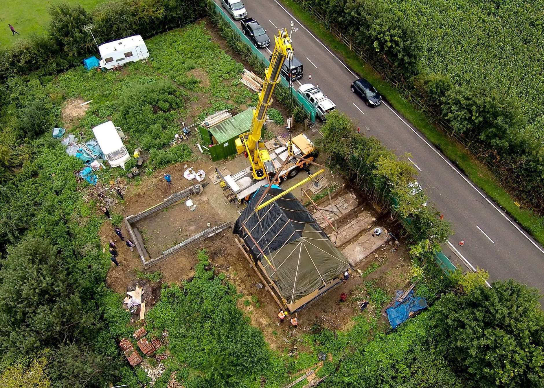 The operation to move the Black House is captured on camera from the air