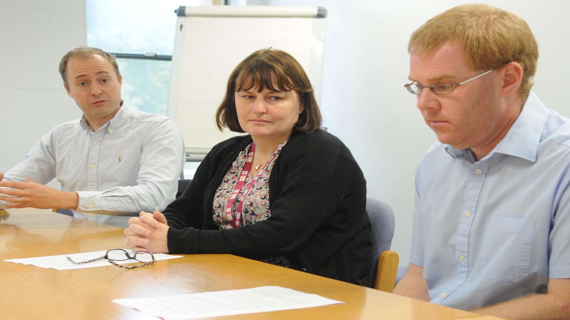 Simon Cook, Larissa Reed, and Rob Davies at the council offices