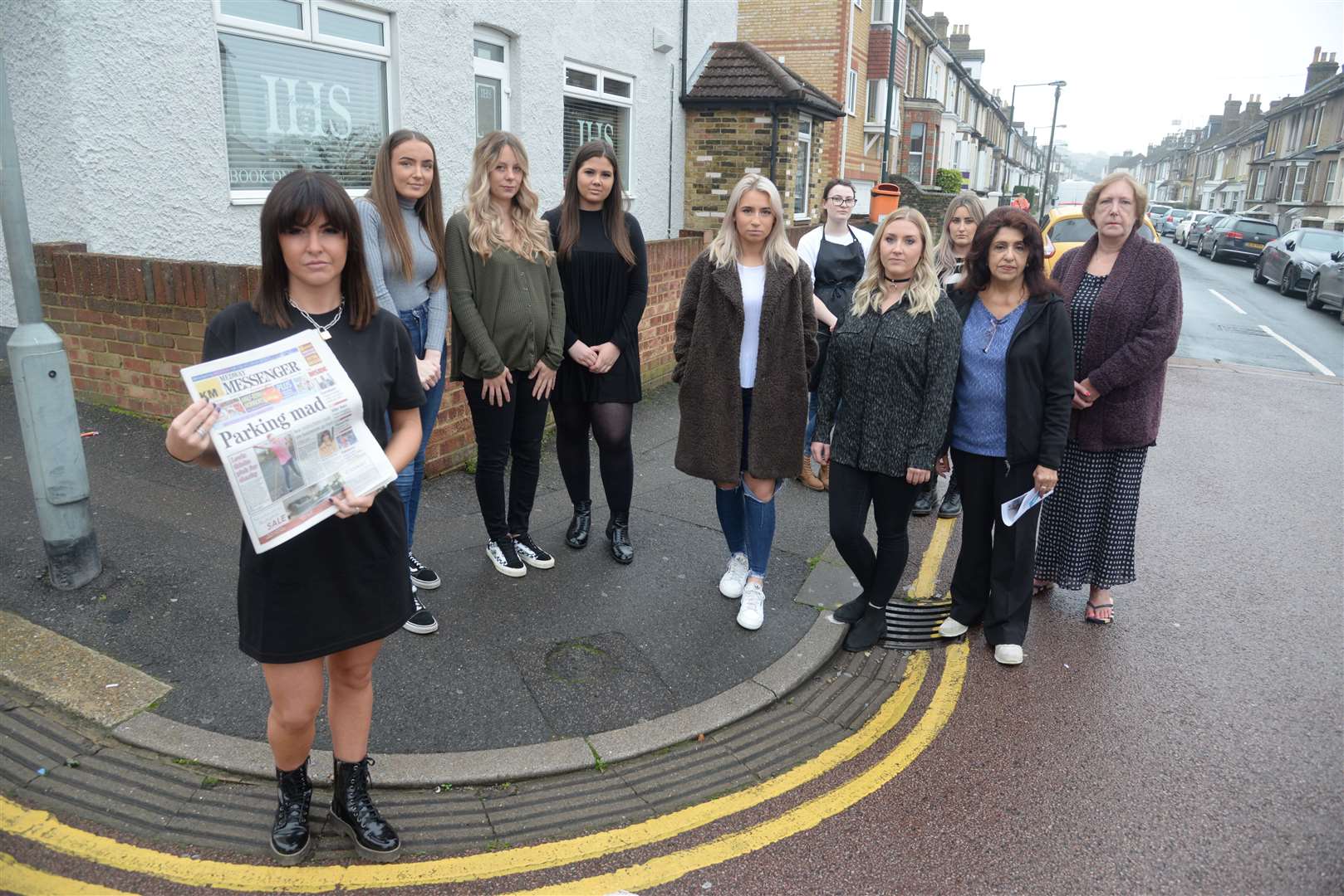 Franki Dallas, her staff and fellow traders and residents who are concerned about the proposed Controlled Parking Zone in the Weston Road area of Strood on Thursday morning. Picture: Chris Davey. (20085059)