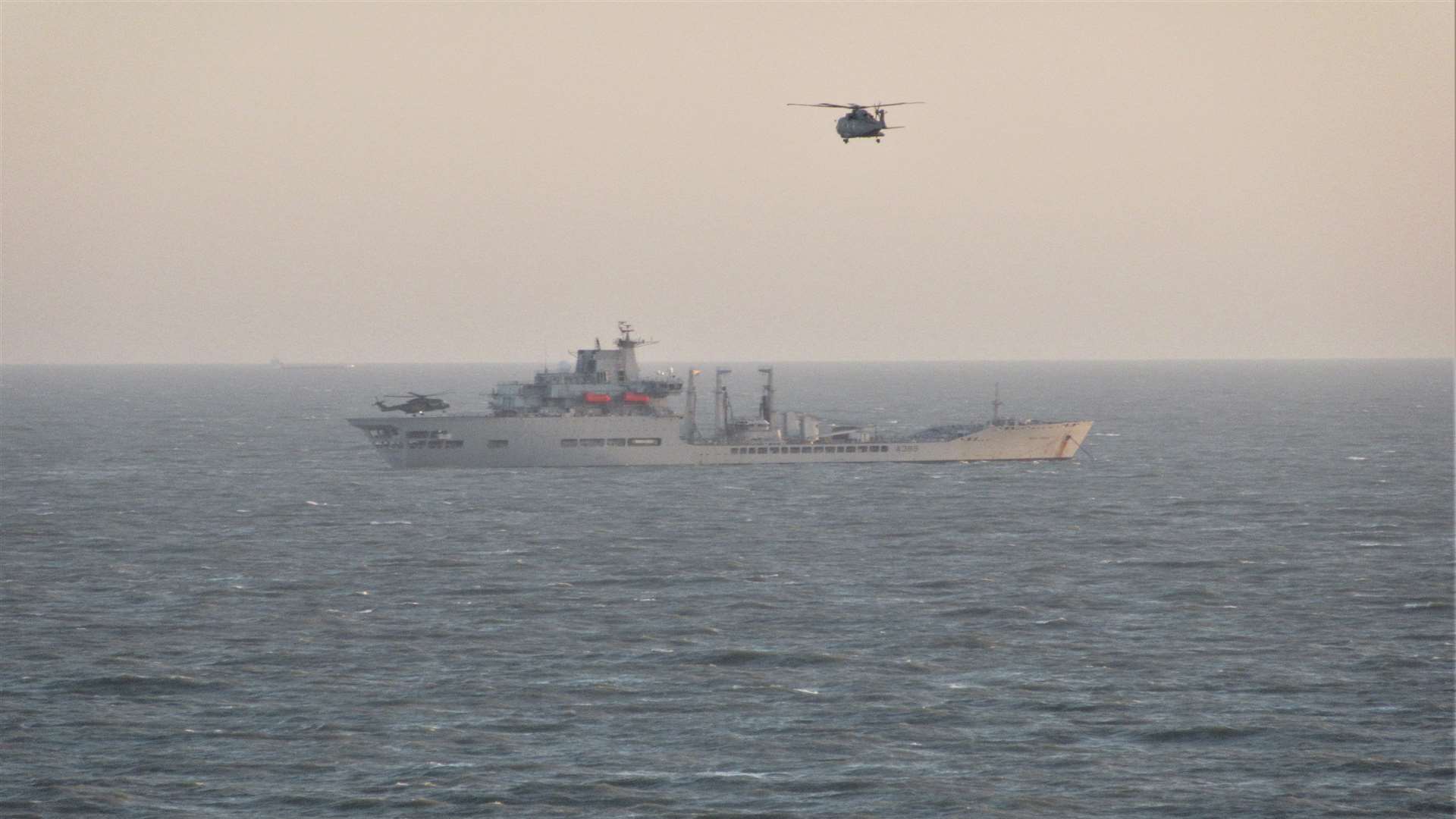 RFA Wave Knight off the Shepway coast operating with two helicopters flying off its deck. Picture: Ted Pragnell