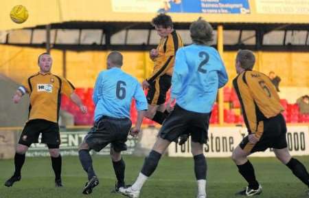 Folkestone Invicta's James Fleet gets a header in during his side's goalless draw at home to Fleet Town in Ryman Division One South. Picture: Gary Browne