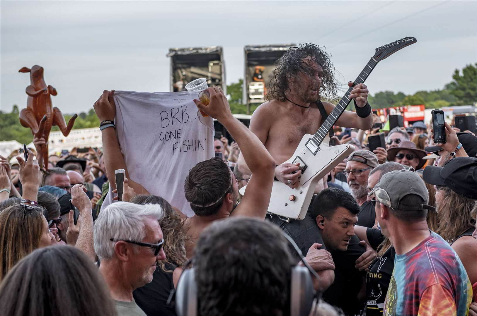 Airbourne frontman Joel heads into the crowd at Ramblin' Man Fair - long before we'd heard about social distancing. Picture: Chris White