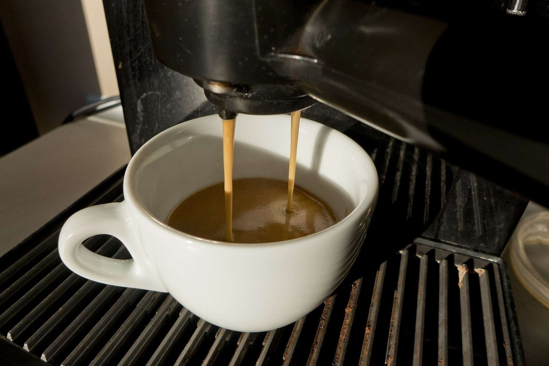 Coffee poured from an office machine. Stock picture