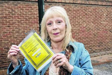 Pamela Penfold got a parking ticket in Chatham but could not see the signs.