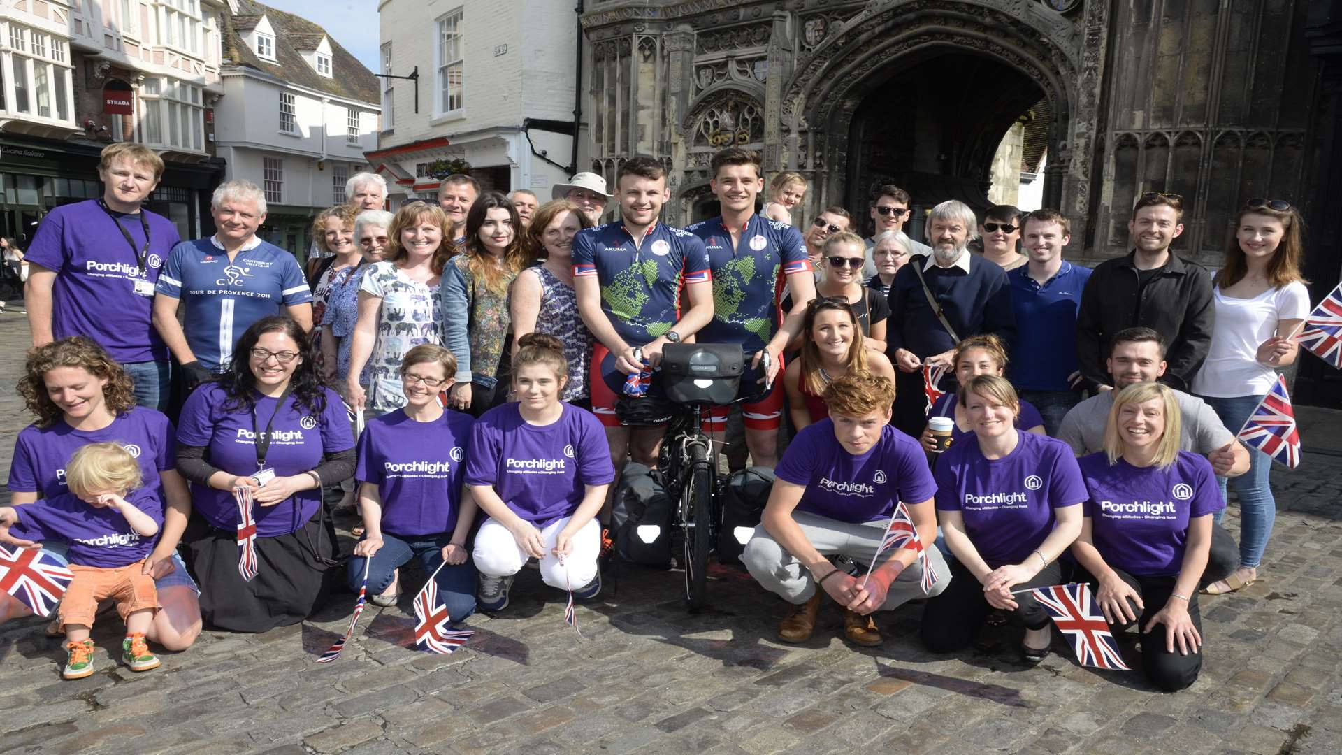 Family and friends bid farewell to George Agate and John Whybrow about to leave Canterbury on their 10-month around the world tandem ride for charity.