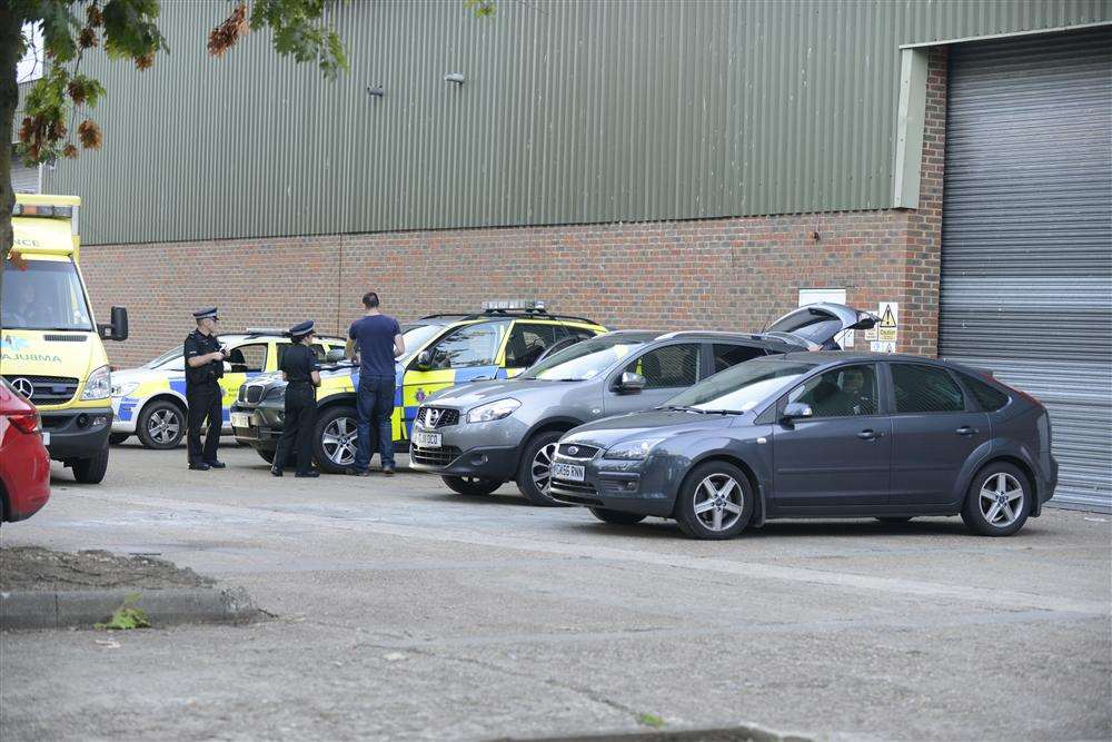 Police team gather at the industrial estate on Pattenden Lane, Marden.