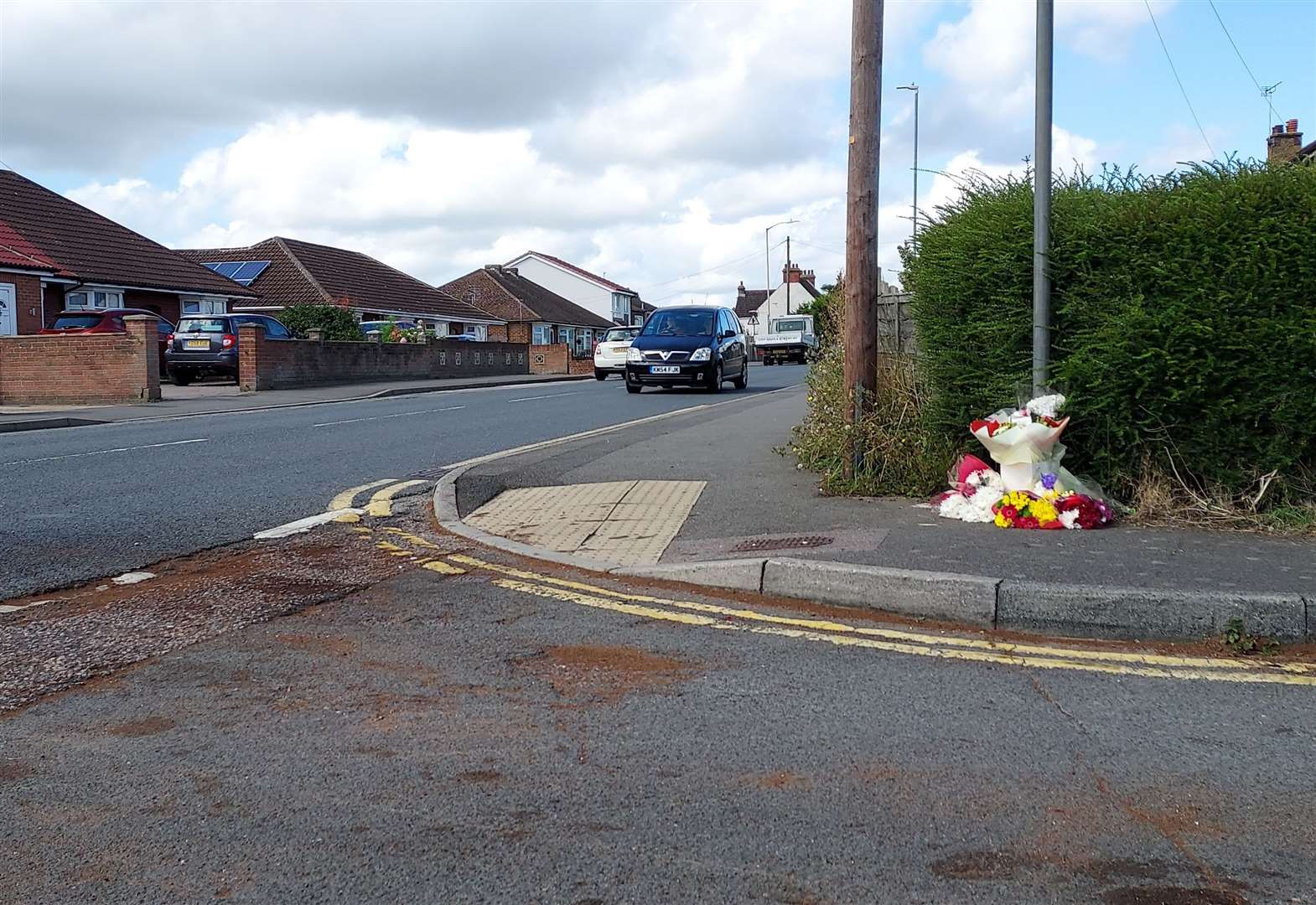 Flowers left at the scene of the accident in Ashford